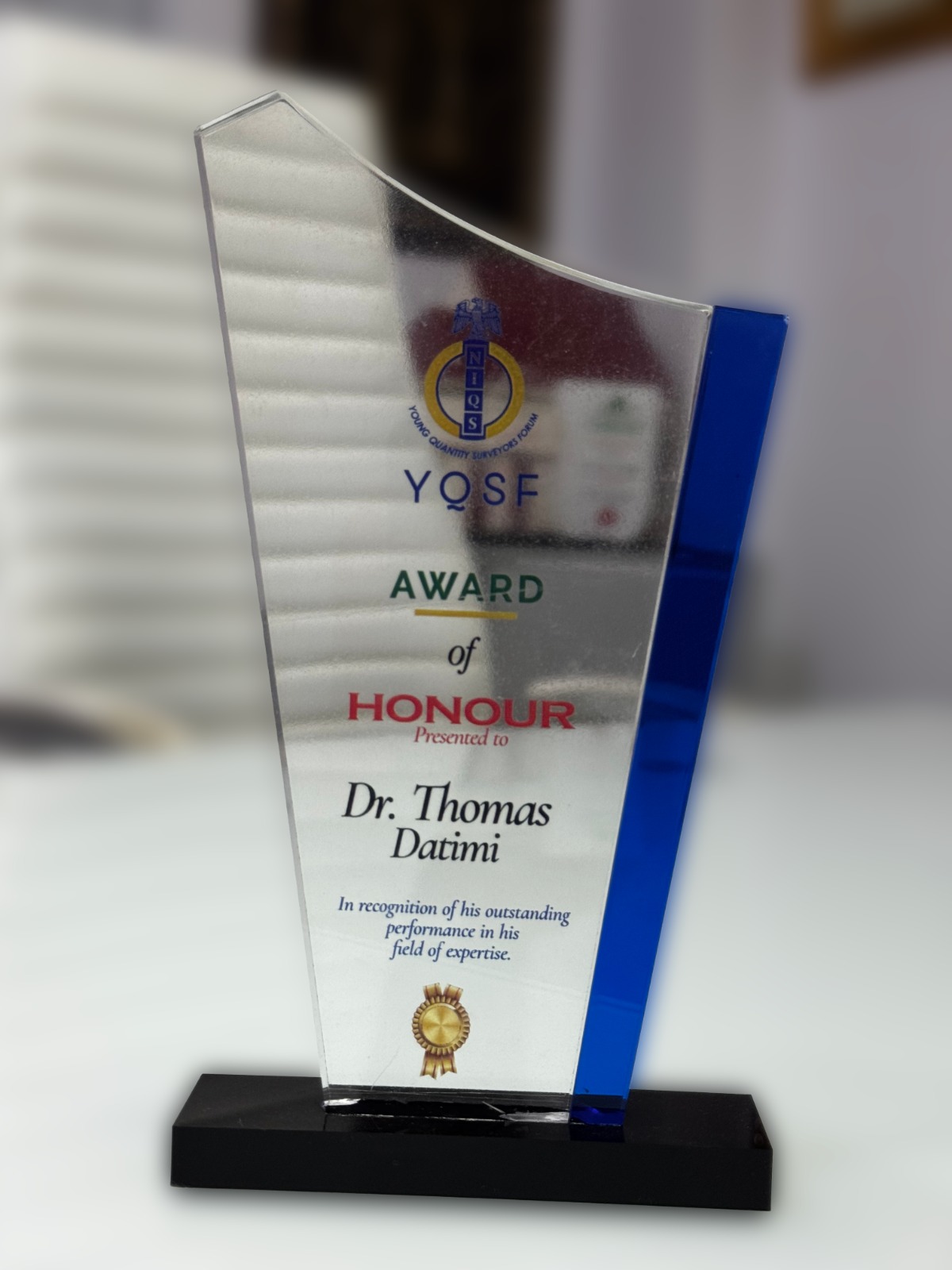 Award of Honour — Young Quantity Surveyors Forum (YQSF / NIQS) to Dr. Thomas Datimi